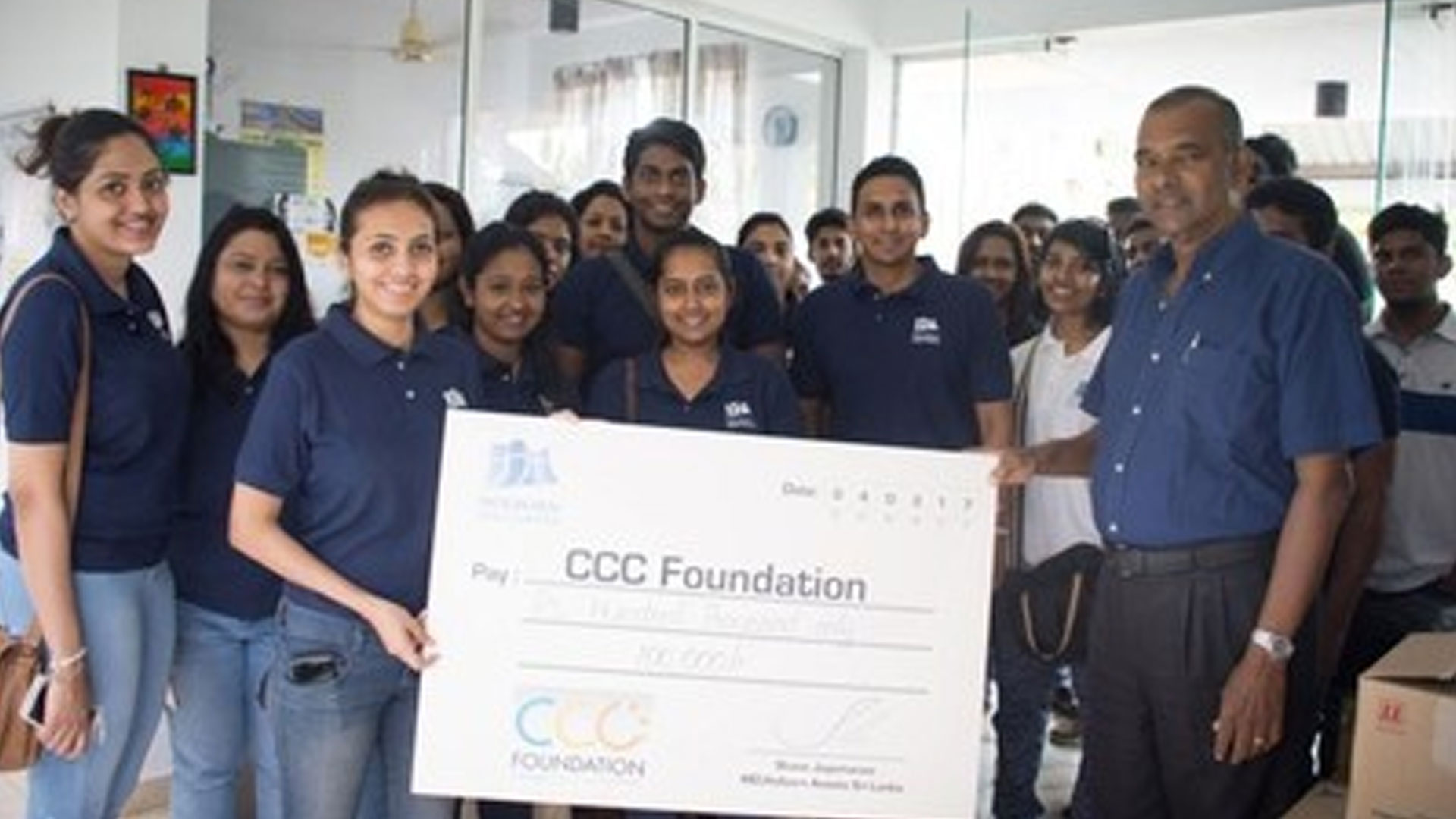 Holborn team donating to the CCC Foundation