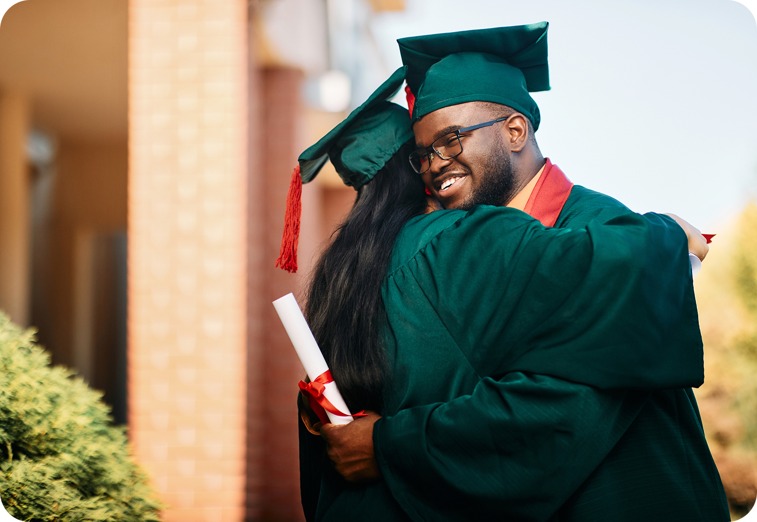 A parent smiling with their child