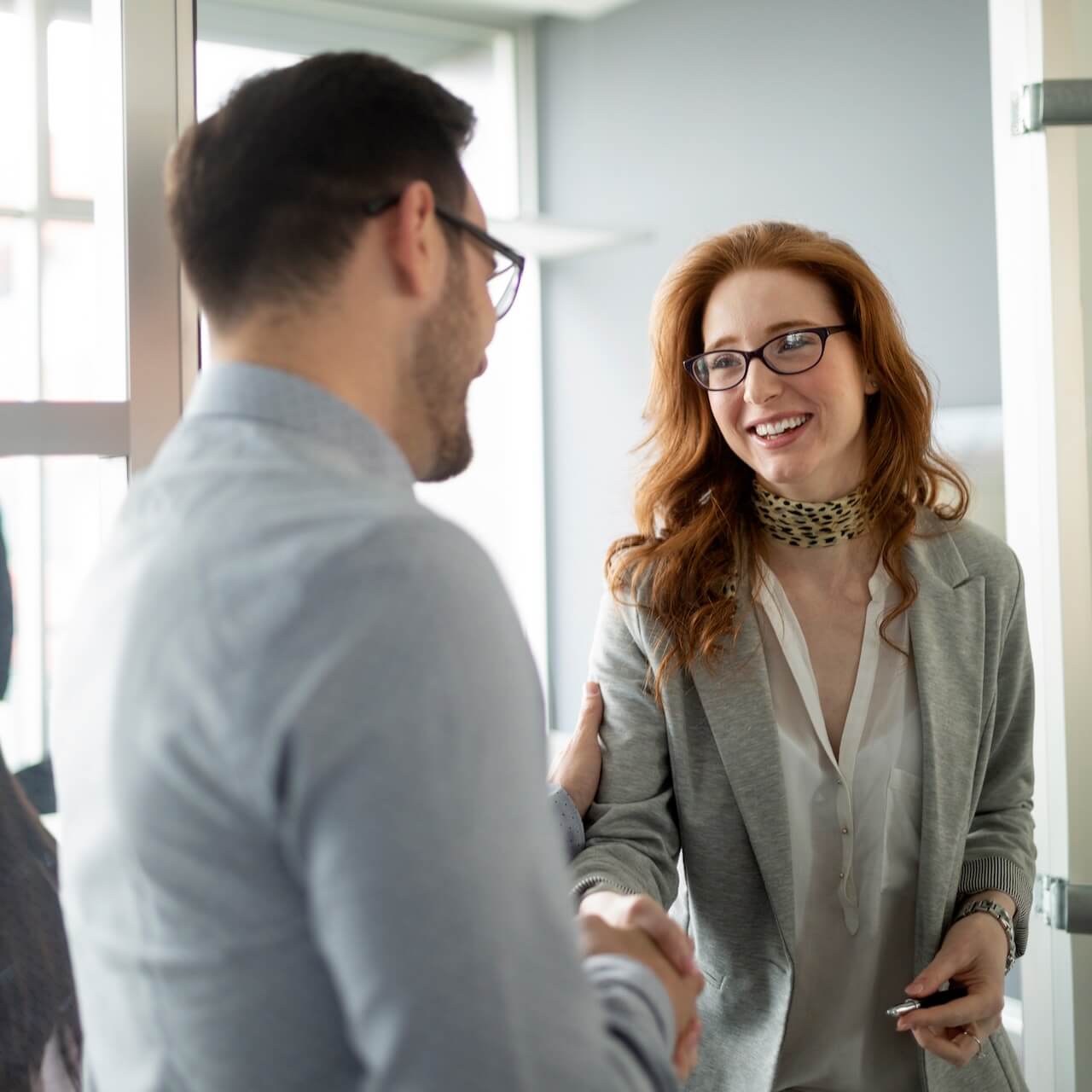 A parent smiling with their child