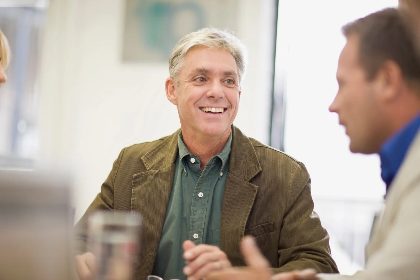 A parent smiling with their child