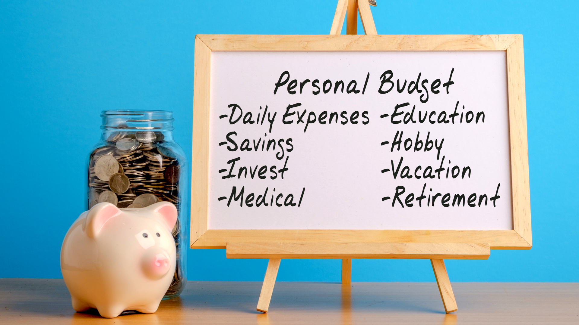 An image of a piggy bank, a jar filled with coins and a board titled Personal Budget. Listed on the board are Daily Expenses, Savings, Invest, Medical, Education, Hobby, Vocation and Retirement. Budgeting strategies with the ratios